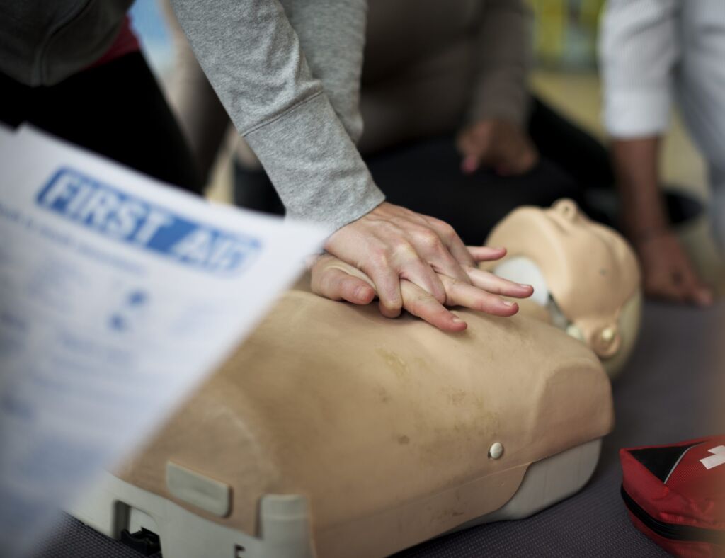Instructor delivering a practical workplace health training session